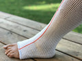 EdemaWear LITE stockinet medium for tender skin for limb circumference up to 90 cm (36"), Orange stripe, Single stockinet  - 1 Each